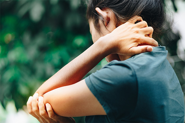 Woman With Sore Arm